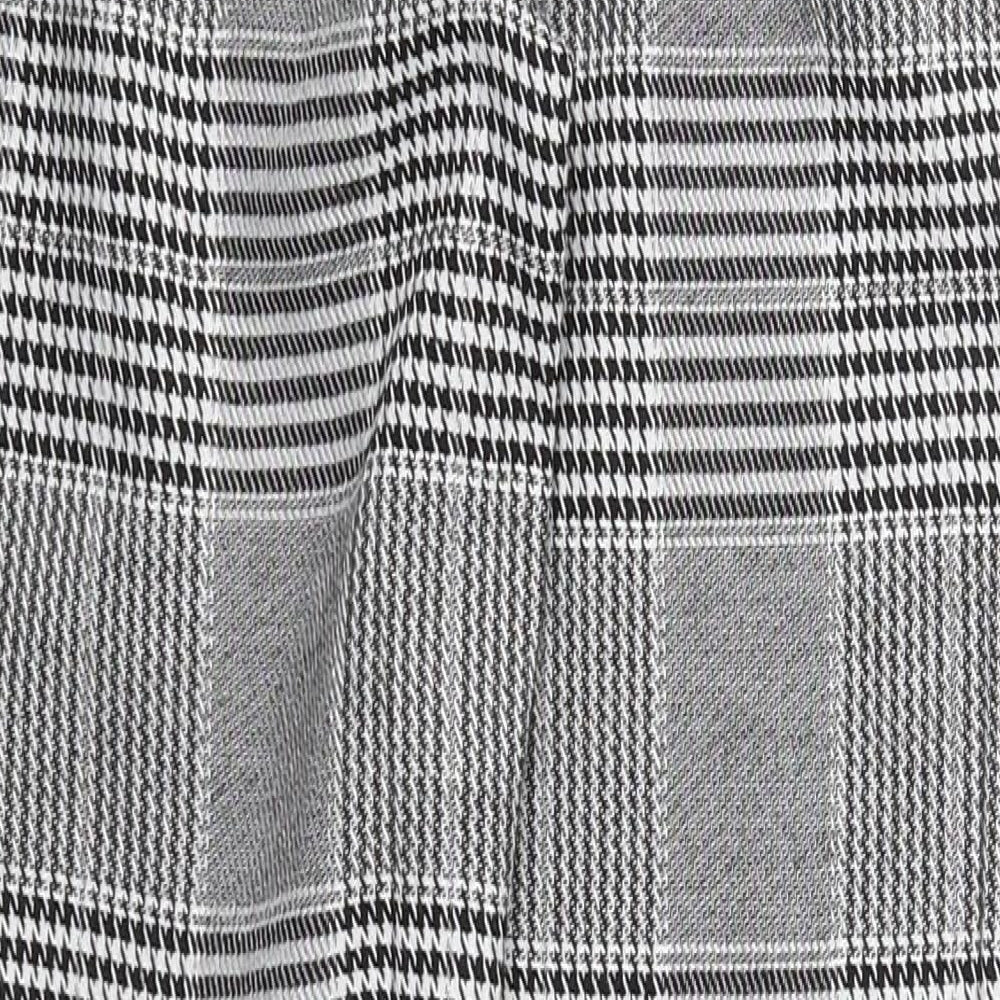 Brand and care label for Parisian women’s grey herringbone polyester trousers, size UK 12, 28-inch leg regular zip