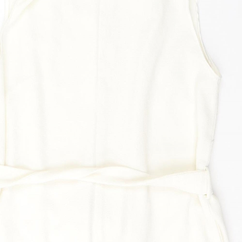 Brand and care label for F&F women’s white v-neck polyester cardigan jumper, size UK 14