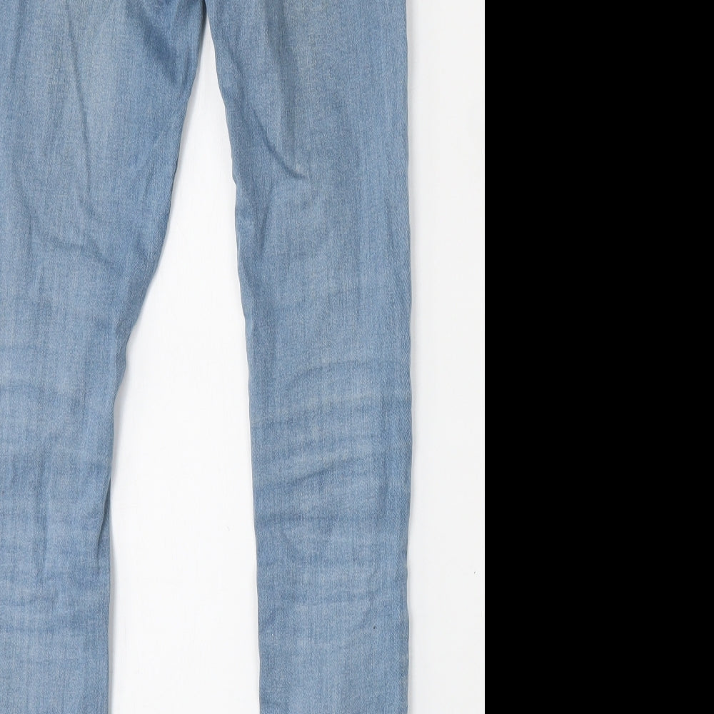 Brand and care label for Zara women’s blue polyester skinny jeans, size UK 26, 27-inch leg regular button