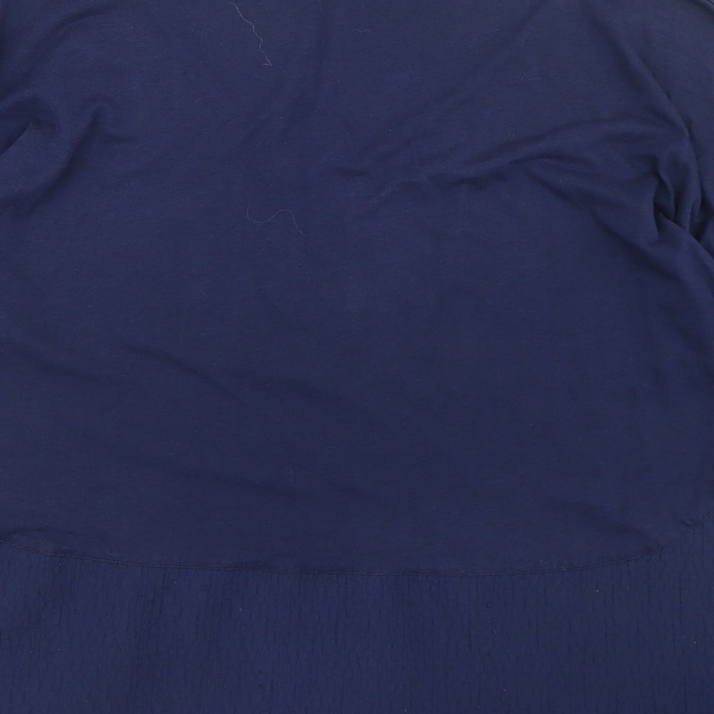 Brand and care label for Great Plains women’s blue cotton basic blouse, size XS, round neck