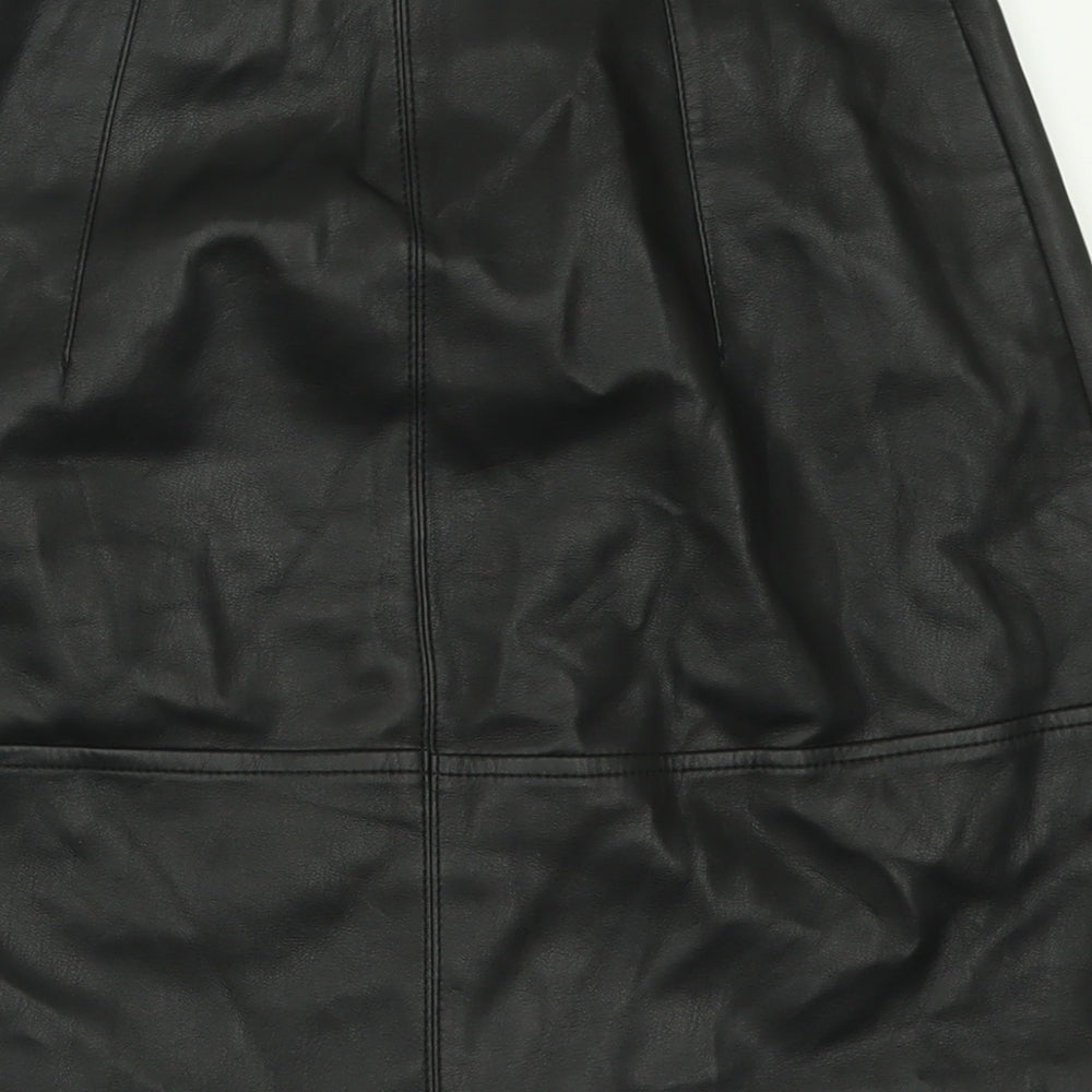 Brand and care label for H&M women’s black polyester a-line skirt, size UK 6, zip