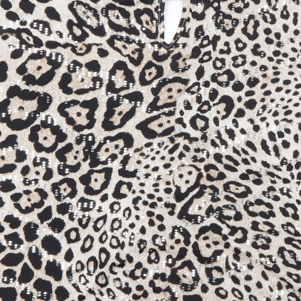 Brand and care label for F&F women’s beige round neck animal print polyester jumper, size UK 12