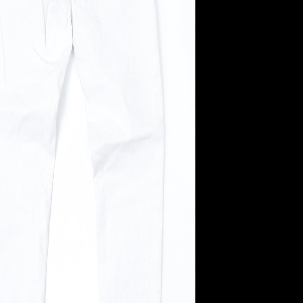 Brand and care label for Topshop women’s white cotton skinny jeans, size UK 25, 28-inch leg regular zip