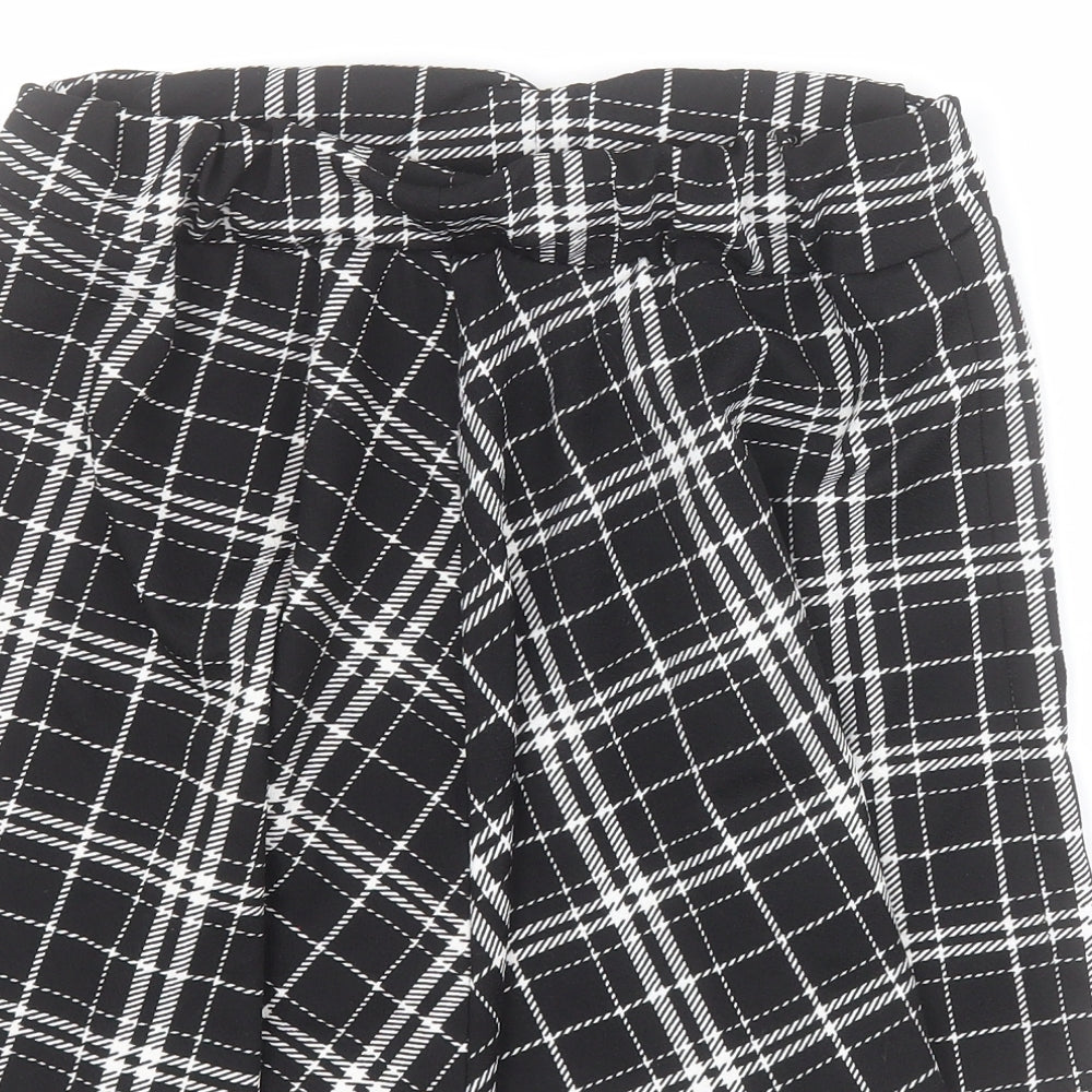 Brand and care label for SHEIN women’s black plaid polyester skater skirt, size M