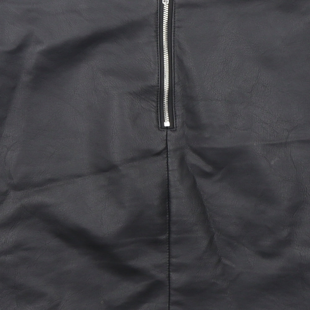 Brand and care label for Primark women’s black polyurethane mini skirt, size UK 6, zip