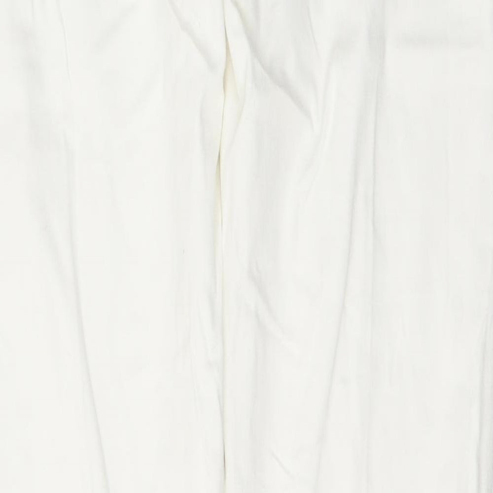 Brand and care label for Zara women’s white cotton straight jeans, size UK 10, 33-inch leg slim button