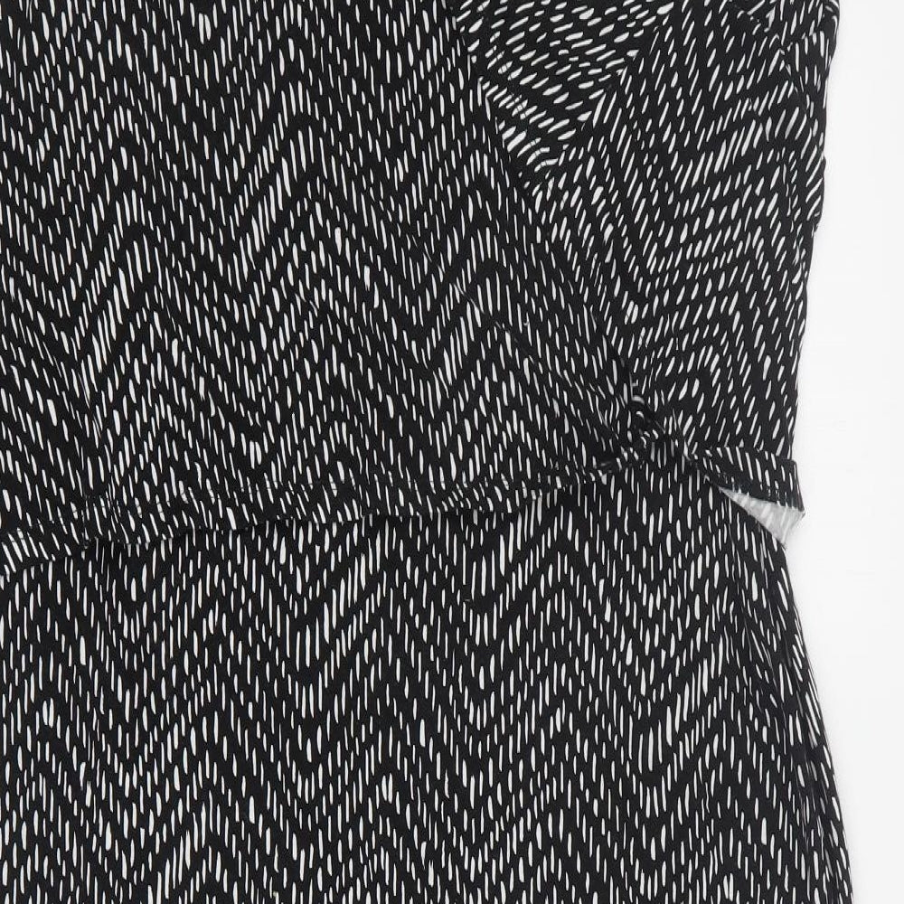 Brand and care label for Target women’s black geometric viscose a-line, size XL, v-neck pullover