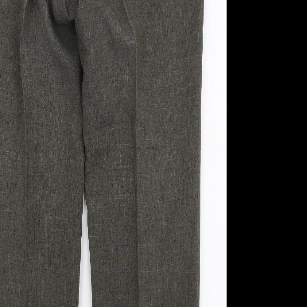 Brand and care label for Marks & Spencer men’s green polyester trousers, size 36, in, 29-inch leg regular zip