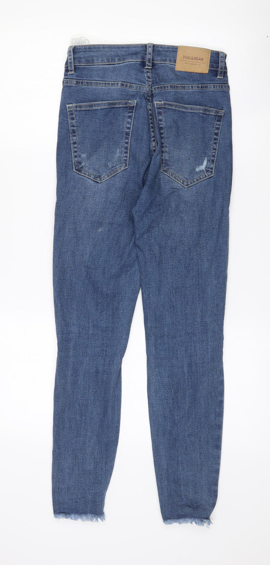 Back view of Pull&Bear women’s blue cotton skinny jeans, size UK 8, 26-inch leg slim zip - ripped