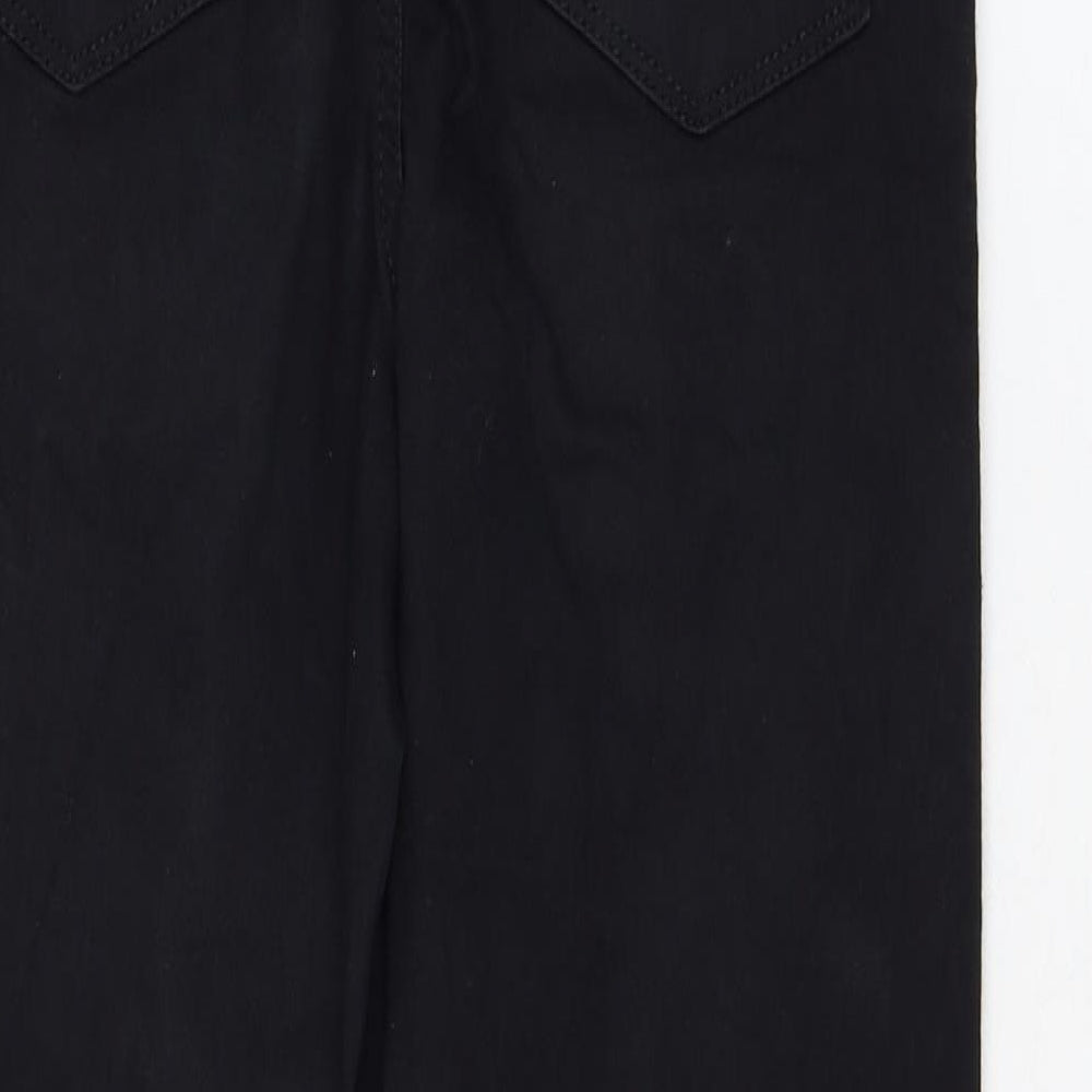 Brand and care label for Miss Selfridge women’s black cotton skinny jeans, size UK 8, 24-inch leg regular zip
