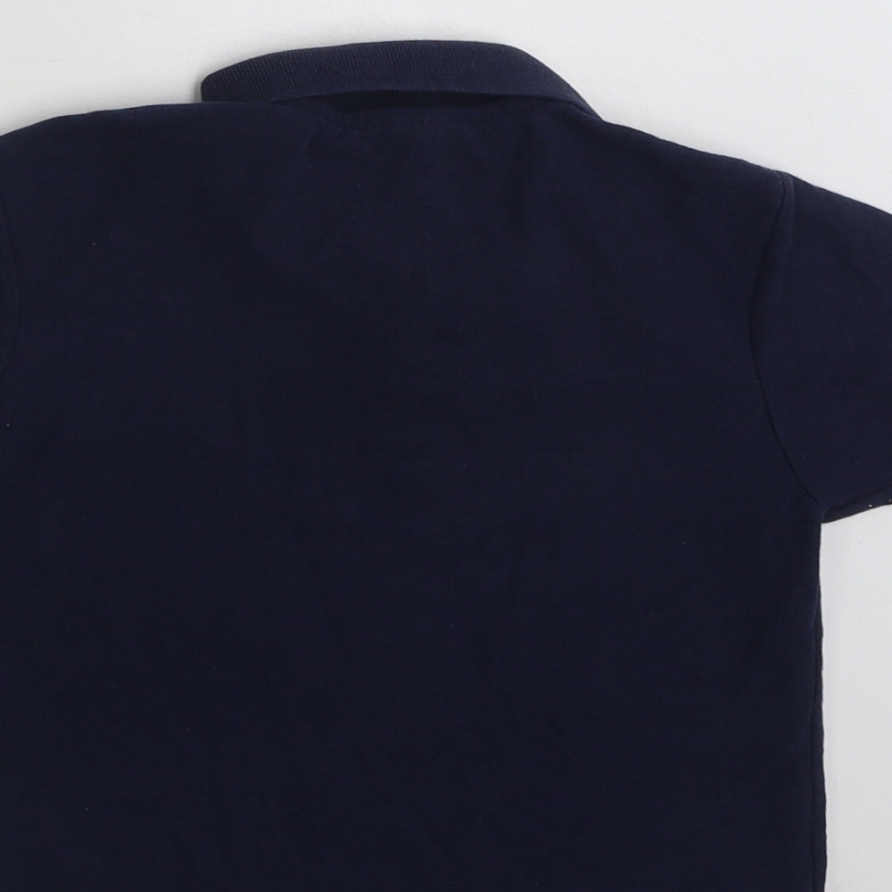 Brand and care label for Fruit of the Loom boys’ blue polyester pullover polo, size 5-6, years collared button