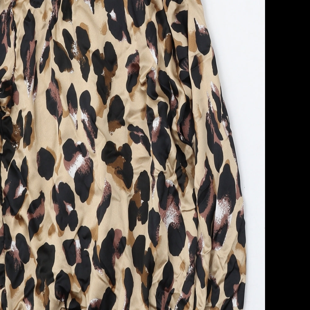 Brand and care label for Quiz women’s multicoloured animal print polyester bodysuit one-piece, size UK 6