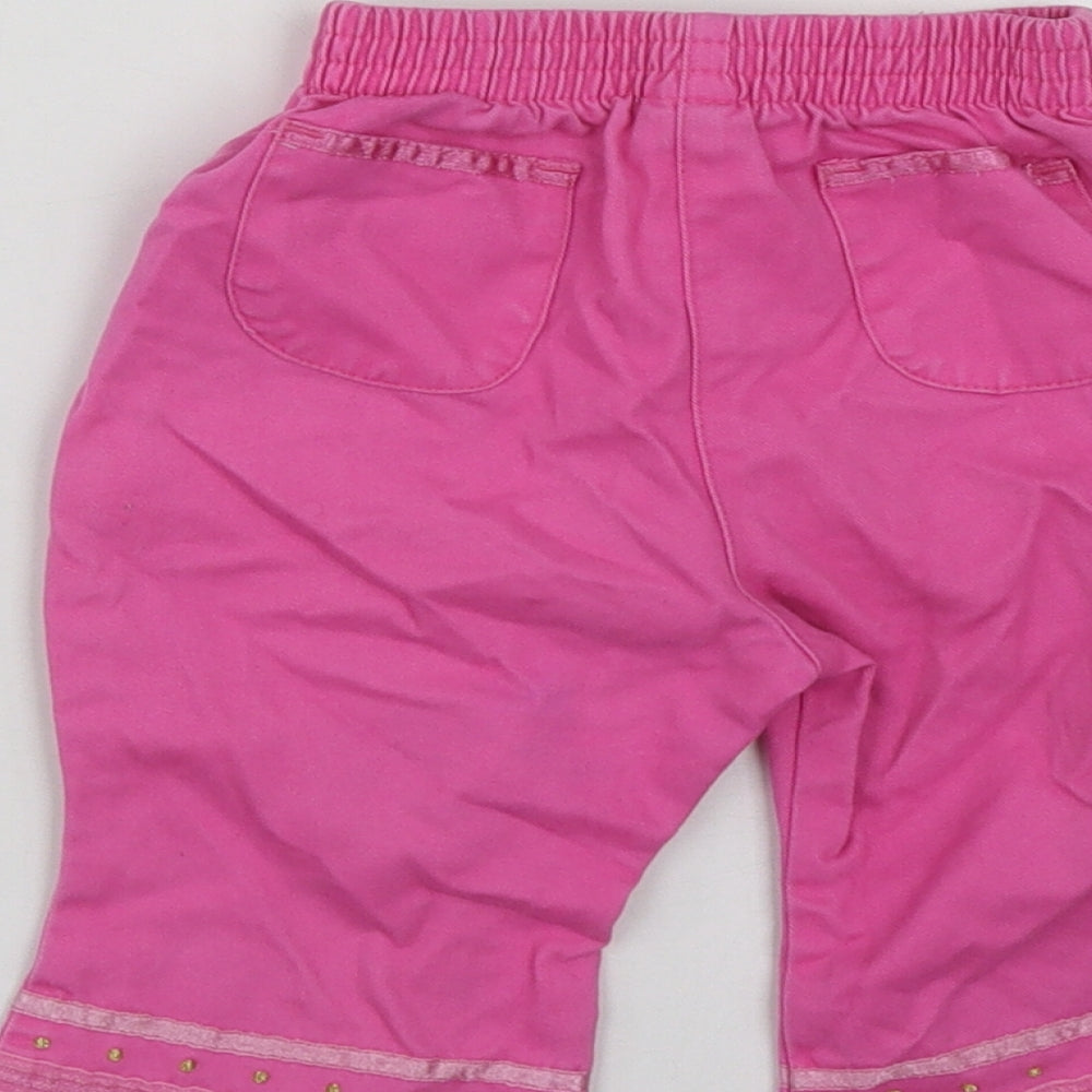 Brand and care label for Adams girls’ pink geometric cotton cropped trousers, size 3-6, months
