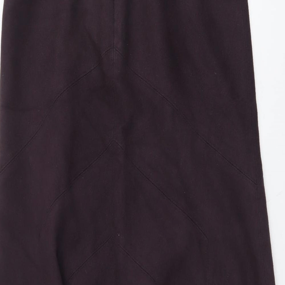 Brand and care label for Marks and Spencer women’s purple polyester swing skirt, size UK 8, zip