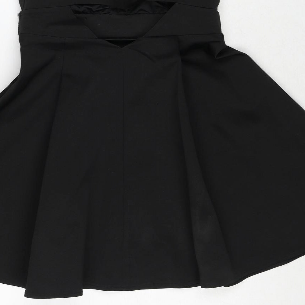 Brand and care label for Lipsy women’s black polyester ball gown, size UK 8, sweetheart zip
