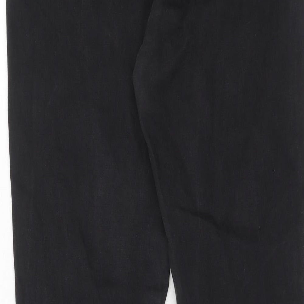 Brand and care label for ASOS women’s black cotton skinny jeans, size UK 31, in, 32-inch leg regular zip