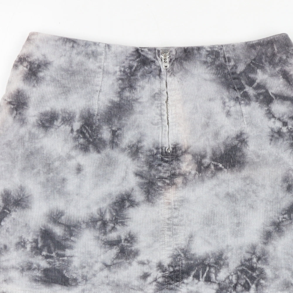 Brand and care label for BDG women’s grey geometric cotton a-line skirt, size XS, zip - tie dye pattern