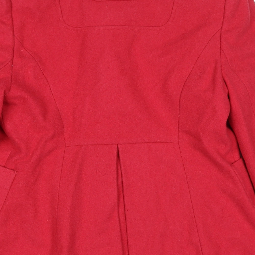 Brand and care label for Red Herring women’s pink jacket, size UK 12, button