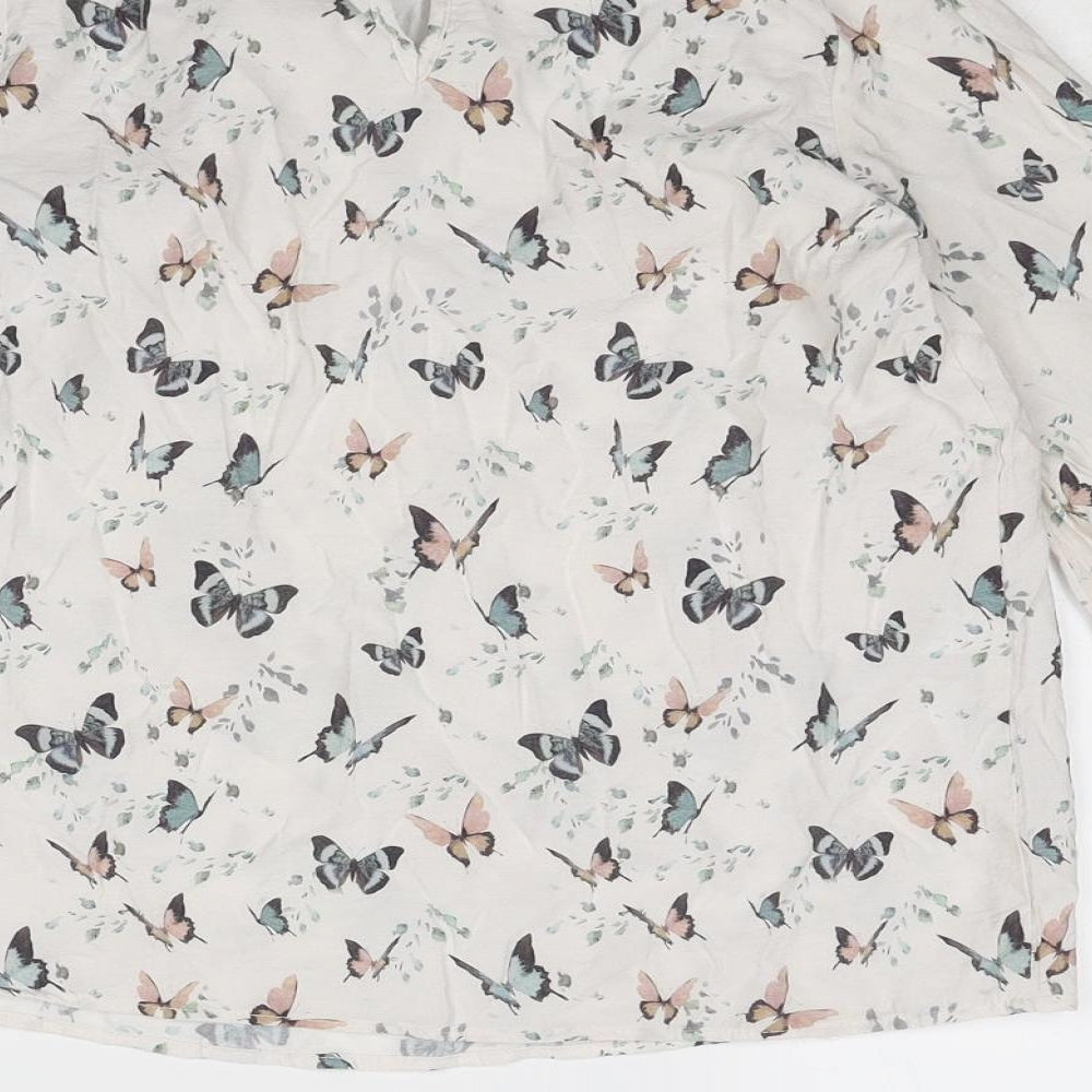 Brand and care label for Mango girls’ beige geometric viscose basic blouse, years mock neck button - butterfly pattern