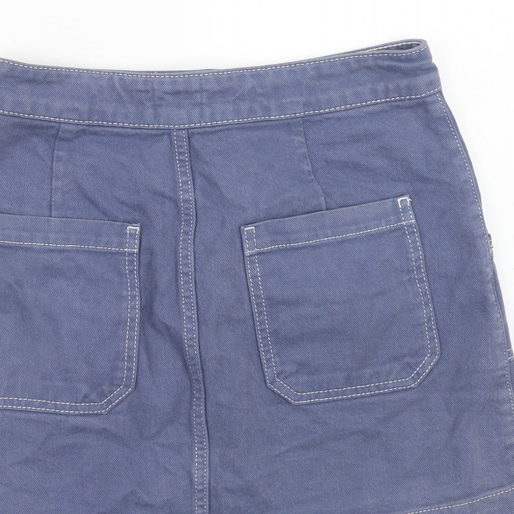Brand and care label for BDG women’s purple cotton a-line skirt, size UK 26, in zip