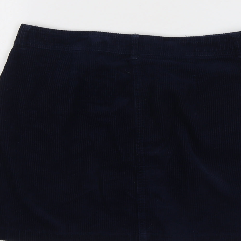 Brand and care label for Miss Selfridge women’s blue cotton a-line skirt, size UK 10, button