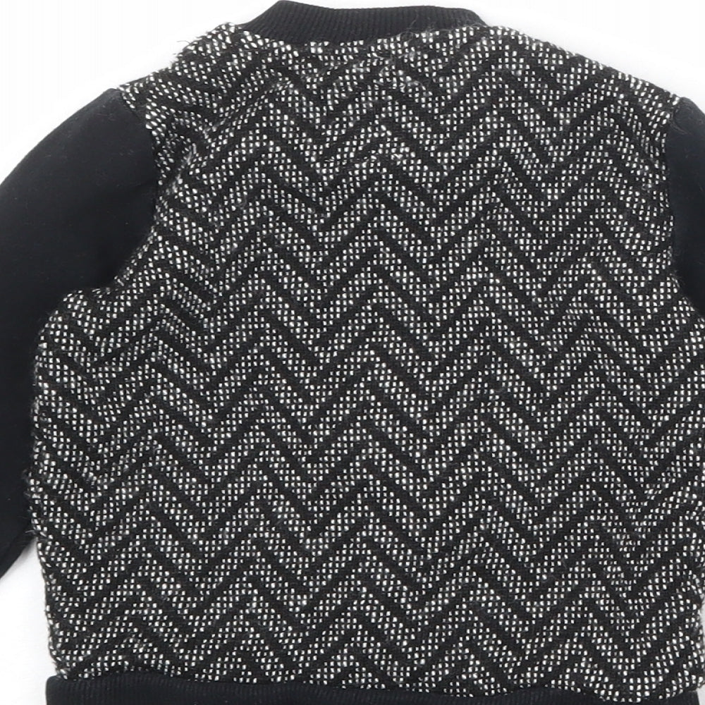 Brand and care label for River Island boys’ black geometric jacket, size 2-3, years zip