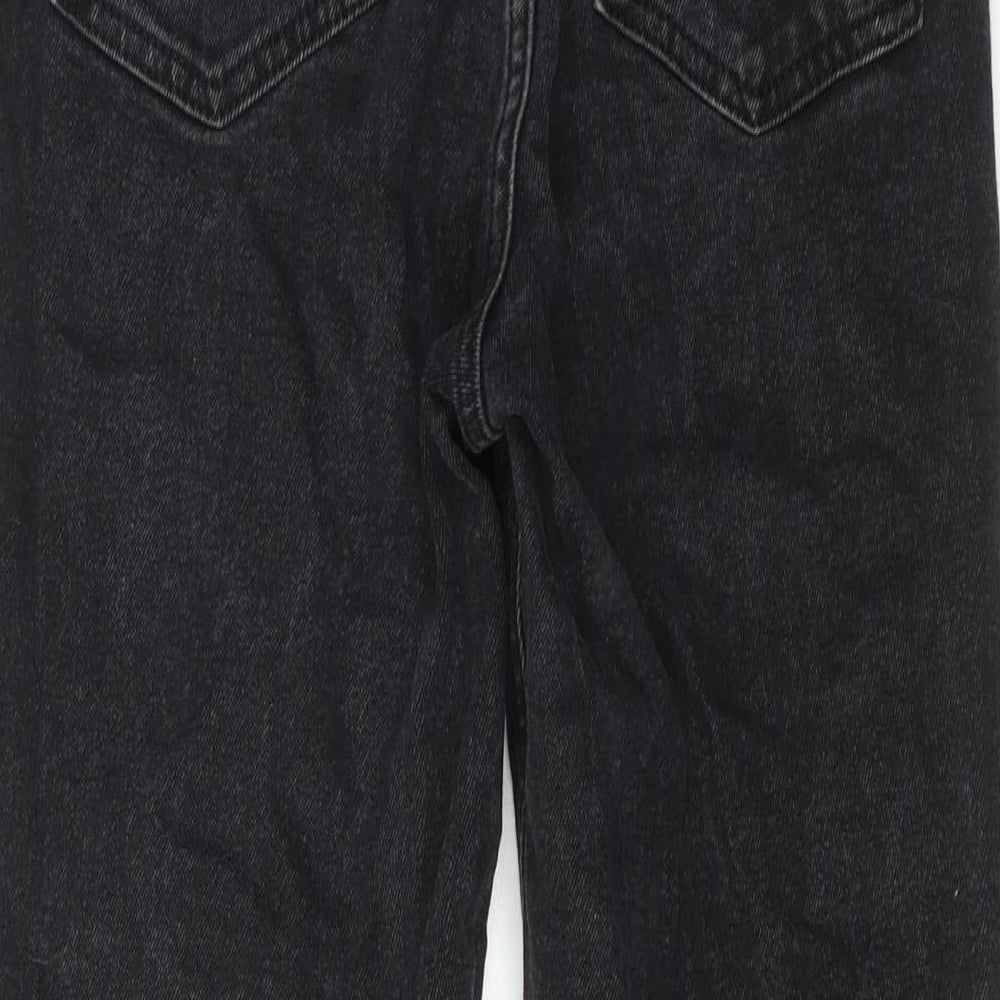 Brand and care label for ASOS women’s black cotton straight jeans, size UK 28, in, 32-inch leg regular zip
