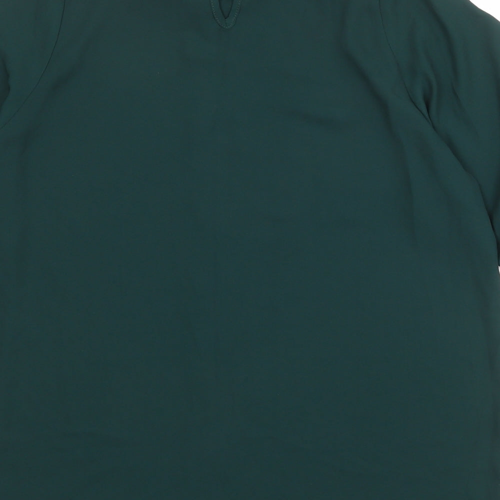 Brand and care label for Autograph women’s green polyester basic blouse, size UK 10, mock neck