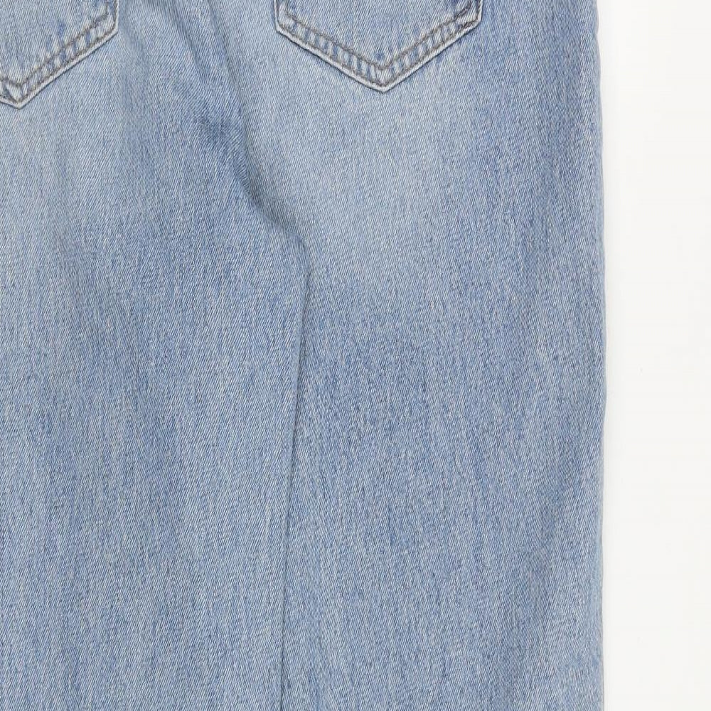 Brand and care label for ASOS women’s blue cotton tapered jeans, size UK 34, in, 30-inch leg regular zip