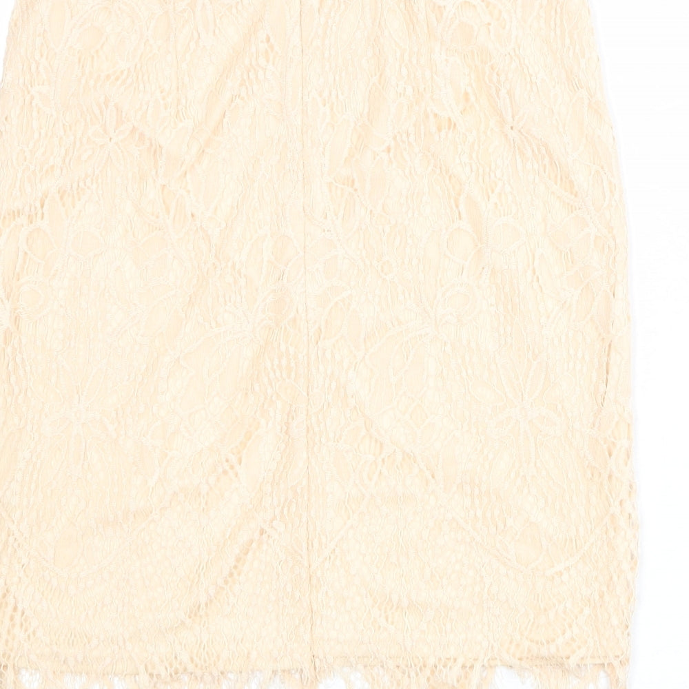 Brand and care label for Missguided women’s pink geometric polyester a-line skirt, size UK 10, zip