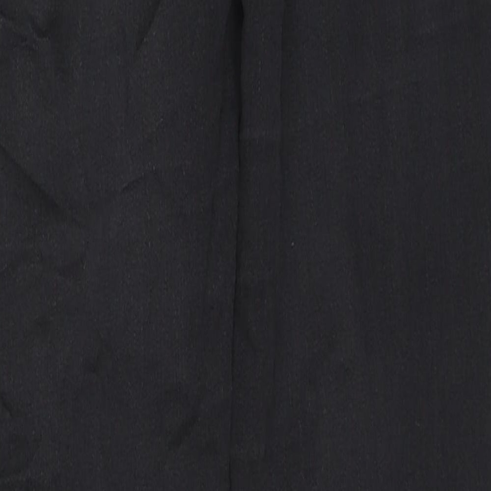 Brand and care label for Topshop women’s black cotton skinny jeans, size UK 25, in, 30-inch leg regular zip