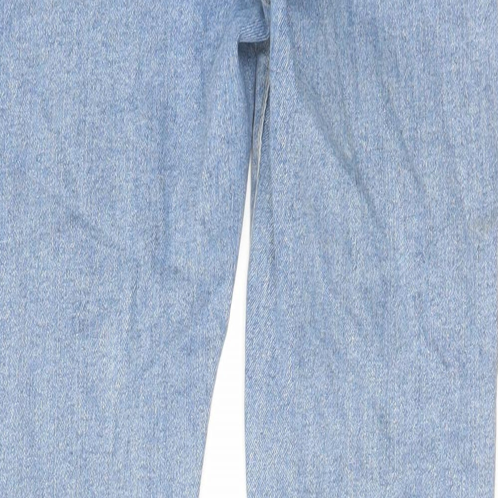 Brand and care label for ASOS women’s blue cotton skinny jeans, size UK 32, in, 32-inch leg regular zip