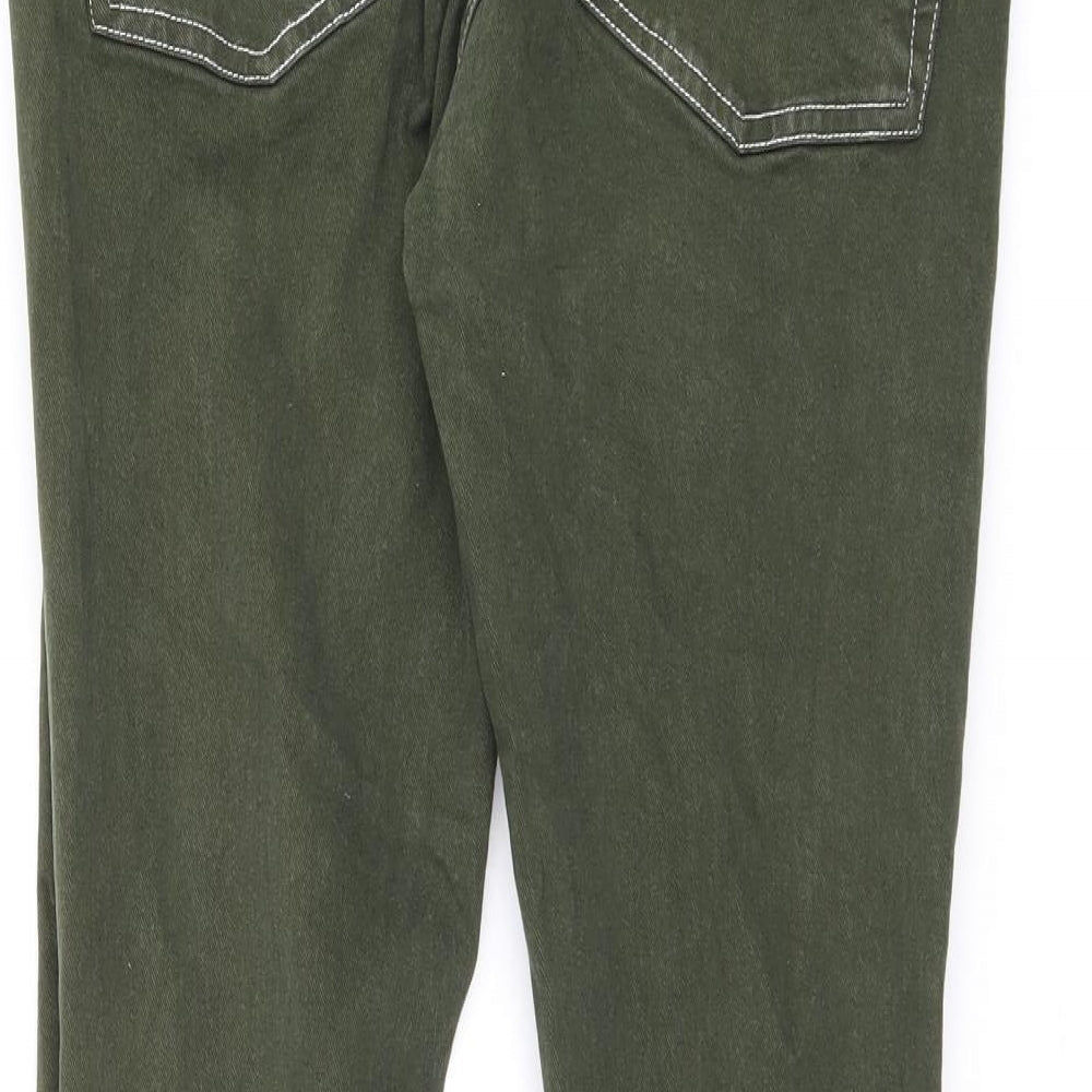 Brand and care label for ASOS women’s green cotton skinny jeans, size UK 32, in, 30-inch leg regular zip - stitching detail