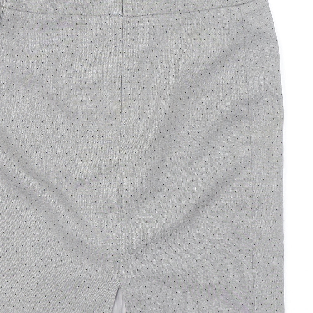 Brand and care label for Miss Selfridge women’s grey geometric polyester a-line skirt, size UK 8, zip