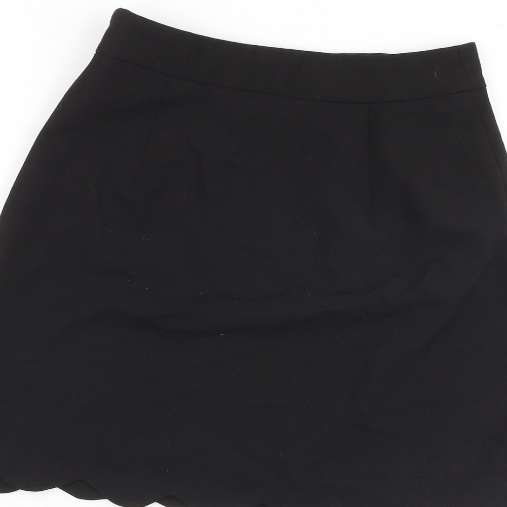 Brand and care label for ASOS women’s black polyester a-line skirt, size UK 6, zip