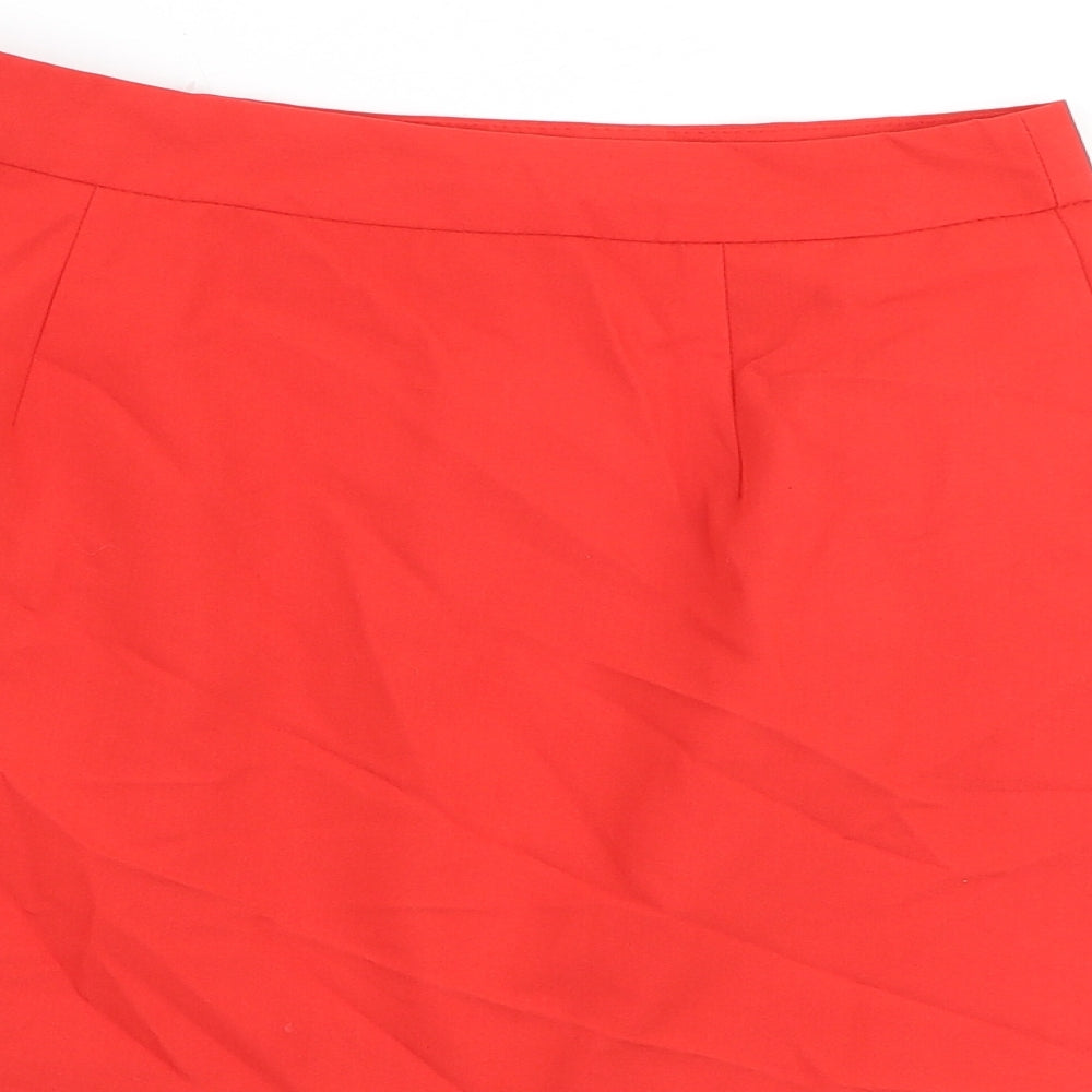 Brand and care label for ASOS women’s red polyester a-line skirt, size UK 10, zip
