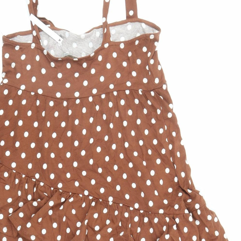 Brand and care label for ASOS women’s brown polka dot cotton tank dress, size UK 10, square neck tie