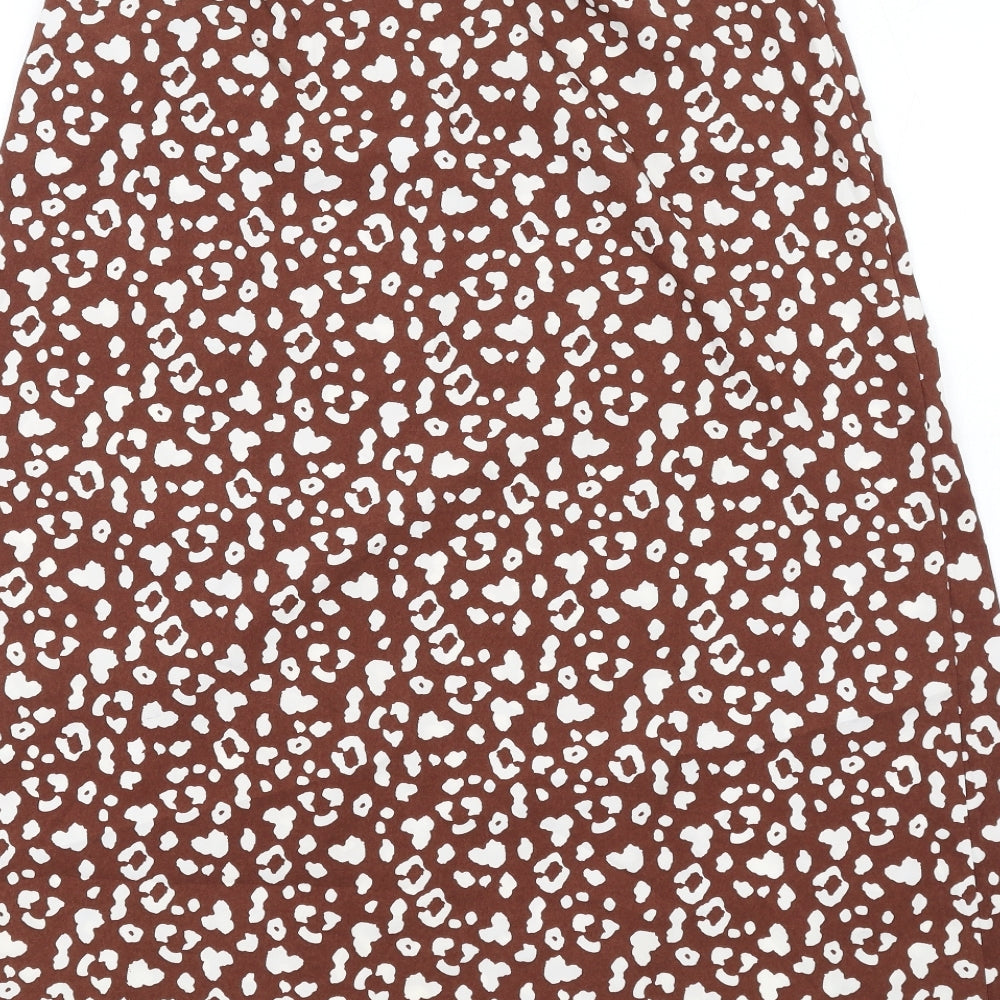Brand and care label for Missguided women’s brown animal print polyester a-line skirt, size UK 6, zip - leopard print