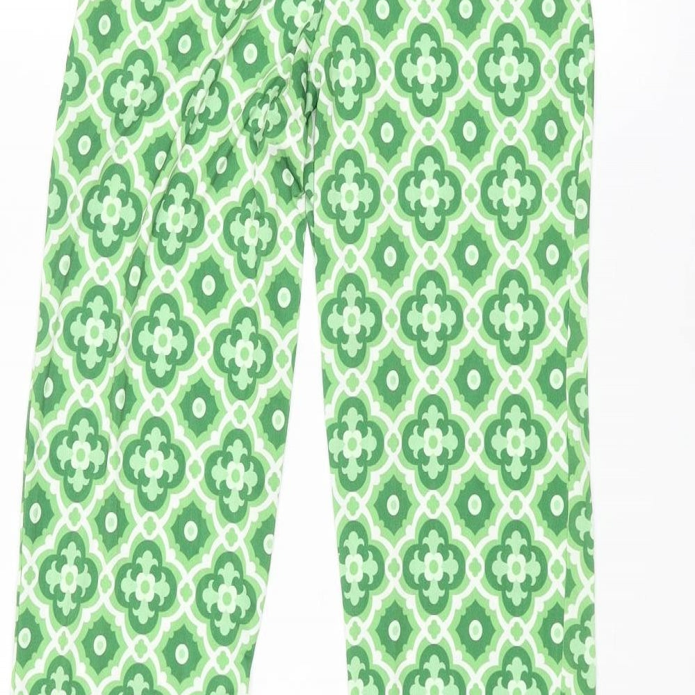 Brand and care label for I SAW IT FIRST women’s green geometric polyester trousers, size UK 4, 33-inch leg regular tie