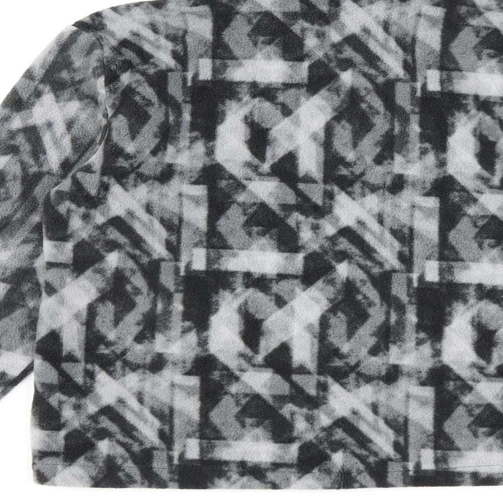 Brand and care label for Eddie Bauer girls’ grey geometric jacket, size 10-11, years zip