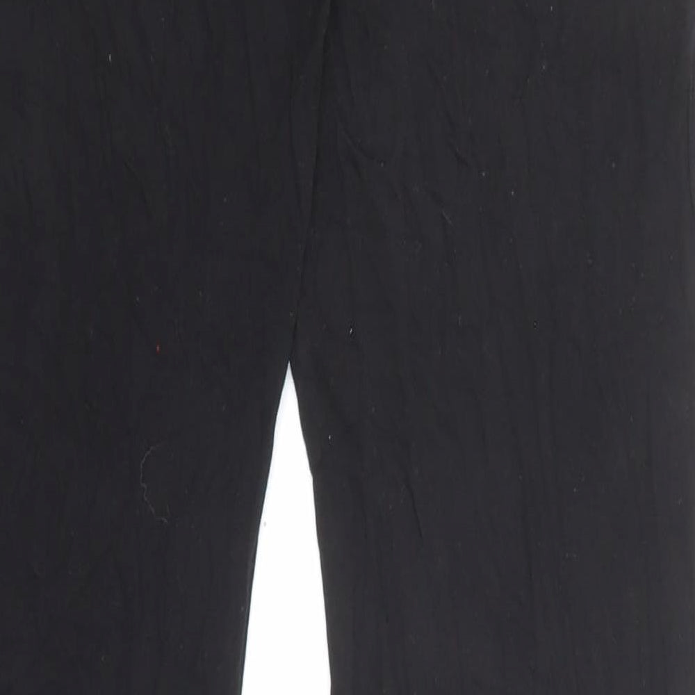 Brand and care label for Missguided women’s black viscose trousers, size UK 10, 32-inch leg regular