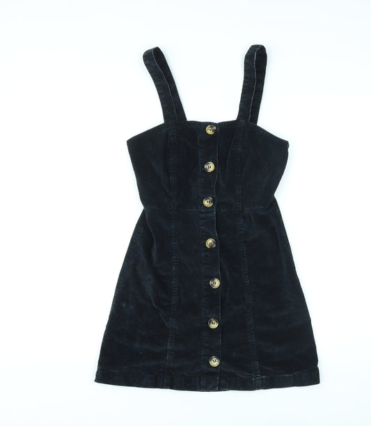 Additional front view of Denim & Co. women’s black cotton pinafore/dungaree dress, size UK 6, square neck button