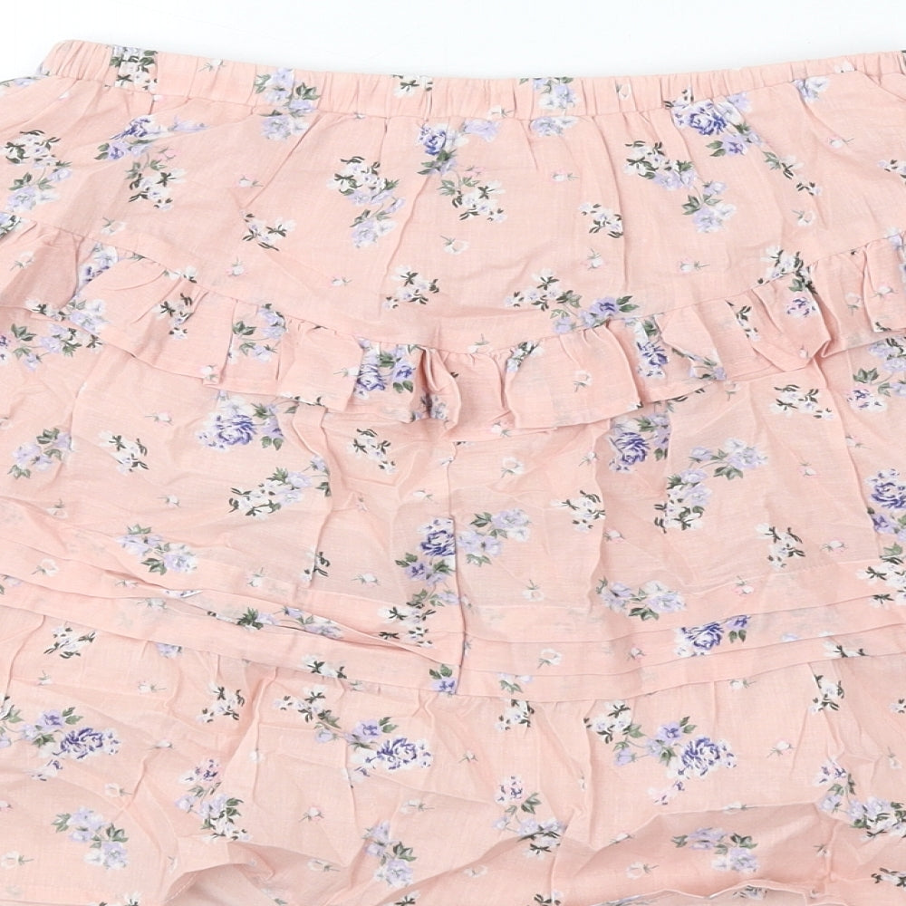 Brand and care label for ASOS women’s pink floral cotton a-line skirt, size UK 8