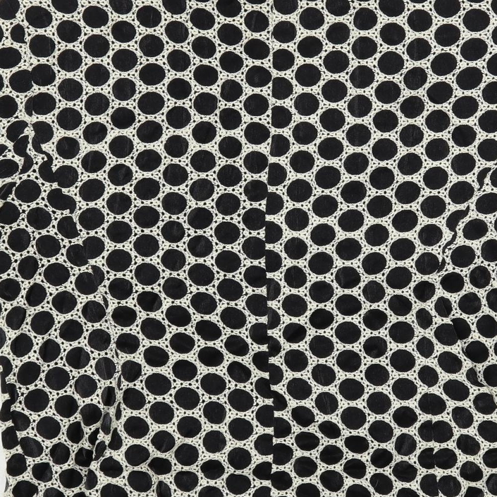 Brand and care label for Alex & Co. women’s black polka dot jacket blazer, size UK 10, button