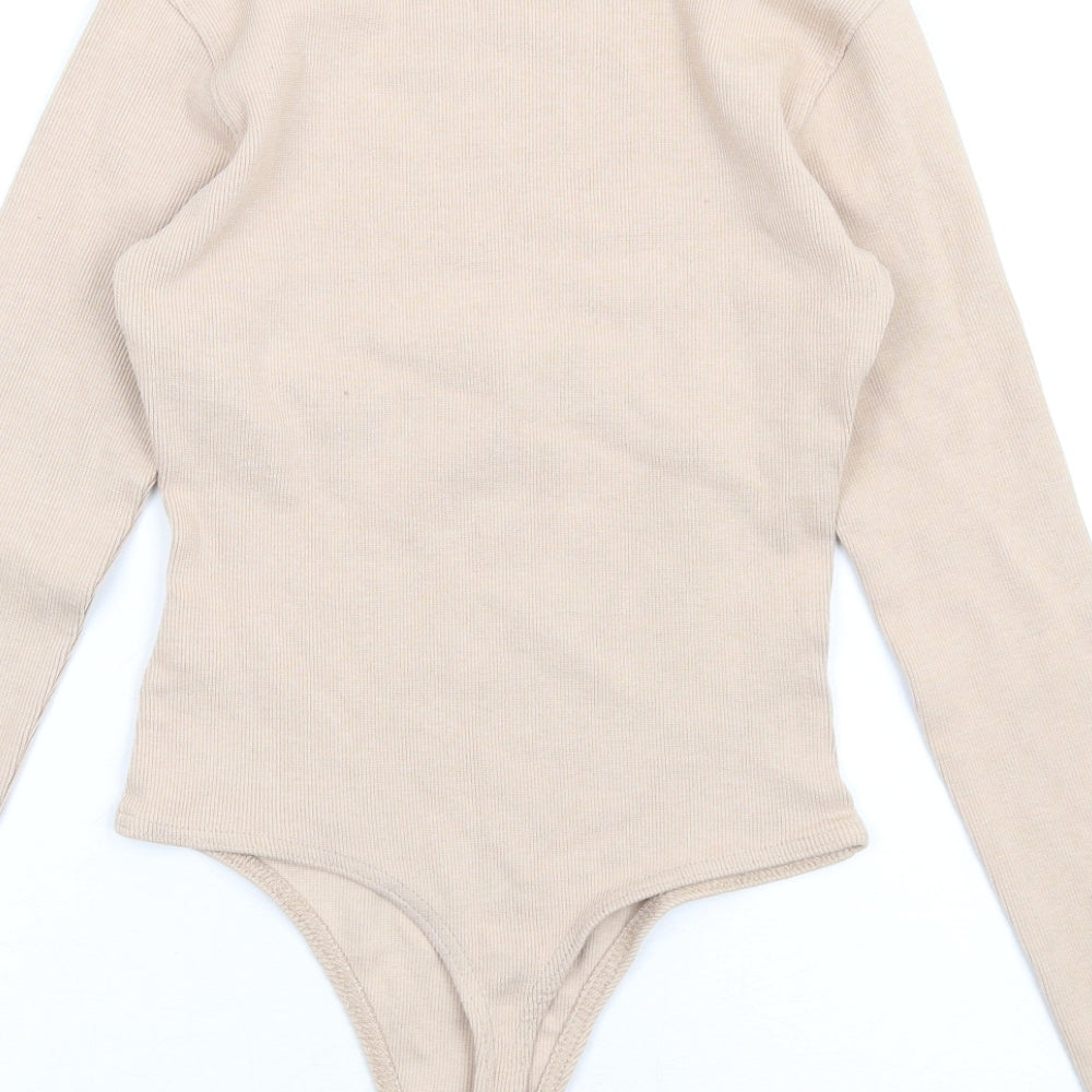 Brand and care label for Missguided women’s beige polyester bodysuit one-piece, size UK 6, snap