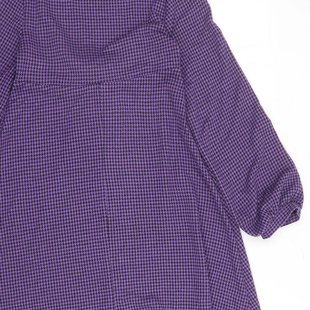 Brand and care label for ASOS women’s purple houndstooth polyester fit & flare, size UK 4, scoop neck pullover