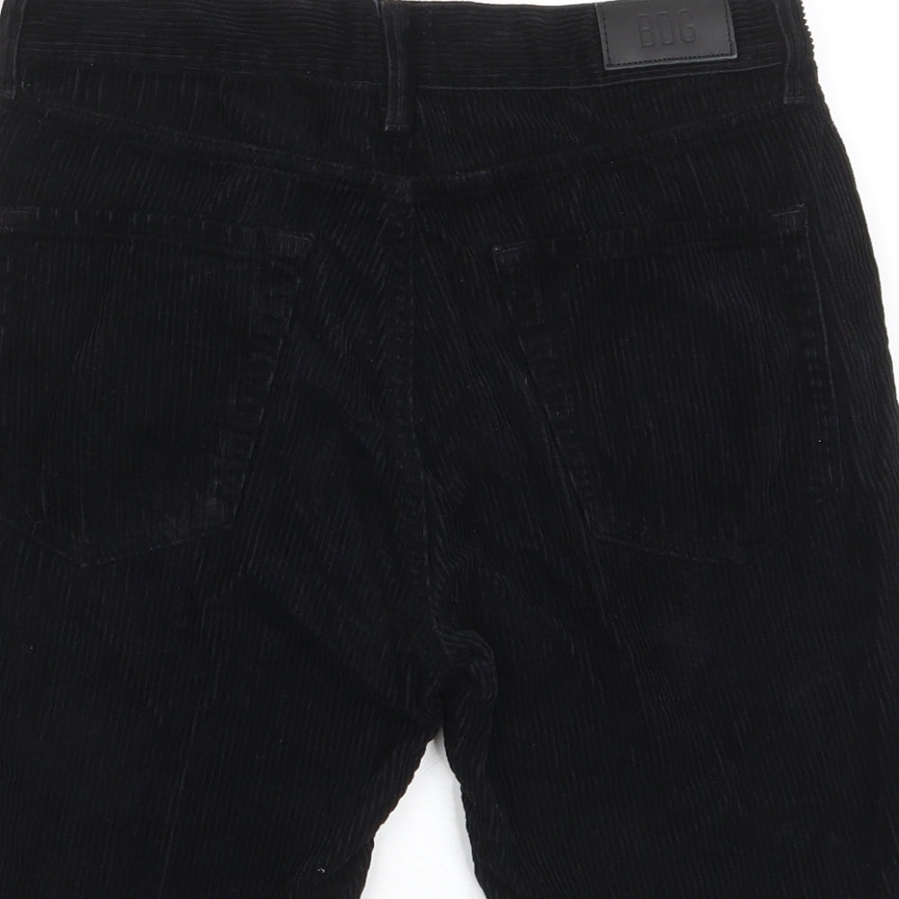 Brand and care label for BDG women’s blue cotton bermuda shorts, size UK 28, in, 9-inch leg regular zip - pockets