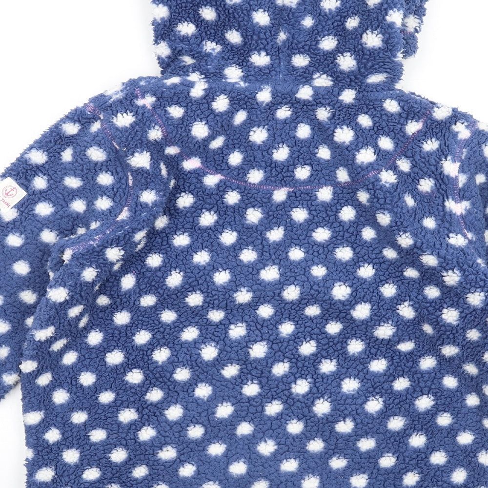 Brand and care label for Lazy Jacks girls’ blue polka dot jacket, size 11-12, years zip