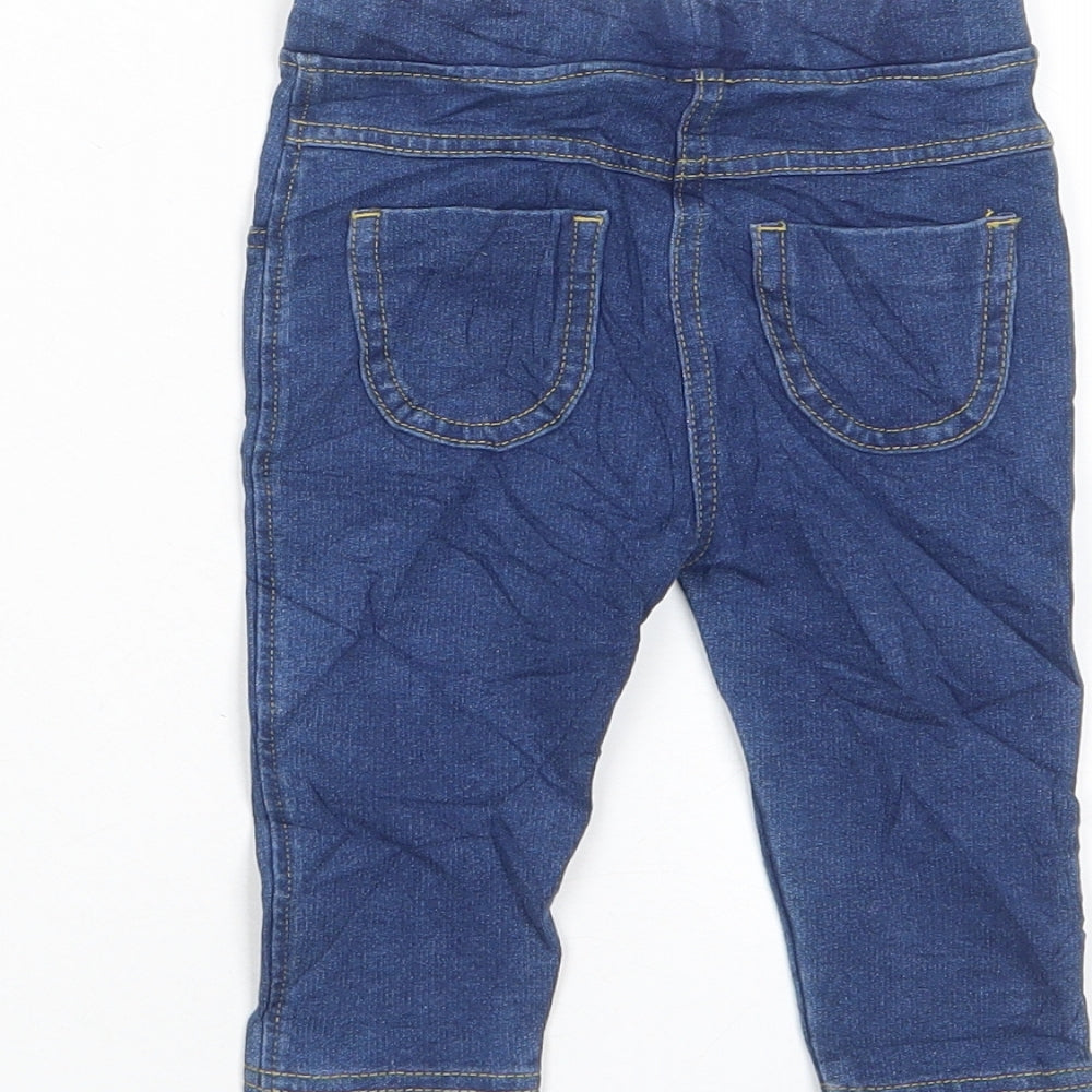 Brand and care label for Marks & Spencer girls’ blue cotton capri jeans, size 6-9, months pullover