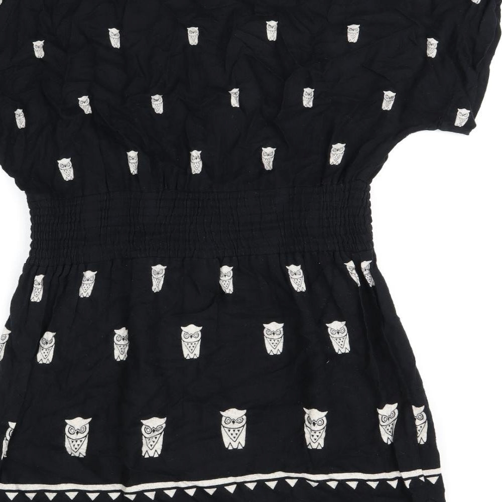 Brand and care label for French Connection women’s black geometric viscose skater dress, round neck button - owl print